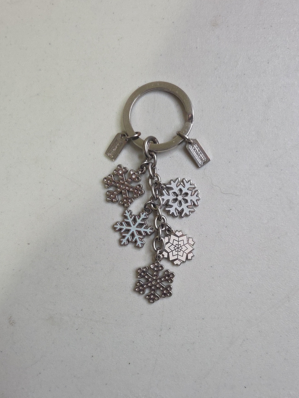 Coach Silver Snowflake Charm Keychain